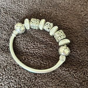 Brighton bracelet, beads are removable by unscrewing the end magnetic closure.